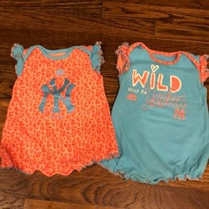 Two baby girl Majestic Yankee outfits.